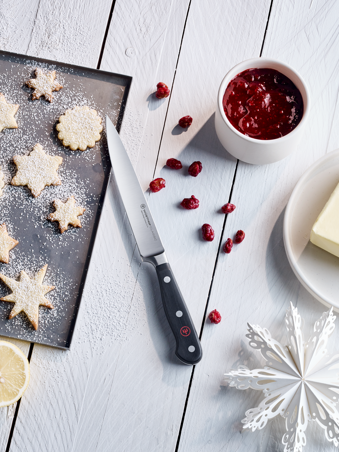 WÜSTHOF Classic Utility Knife with holiday cookies and jam
