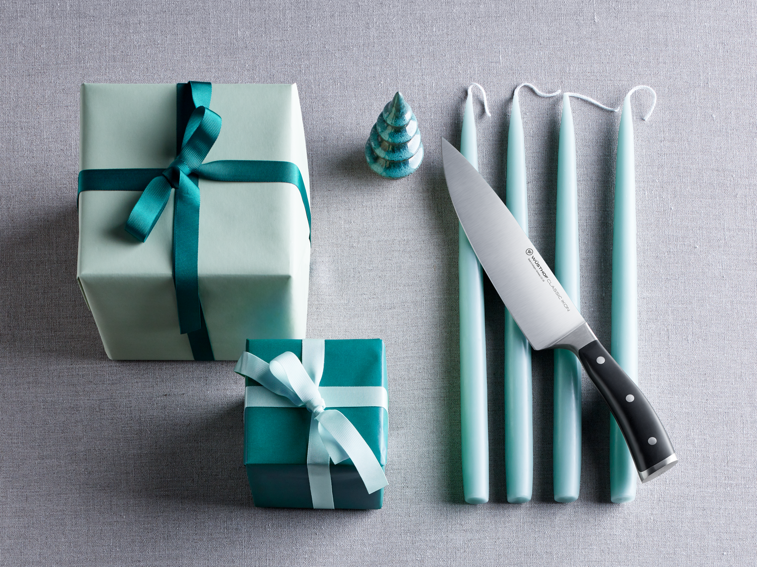 WÜSTHOF Classic Ikon Chef's Knife with gifts and holiday decor