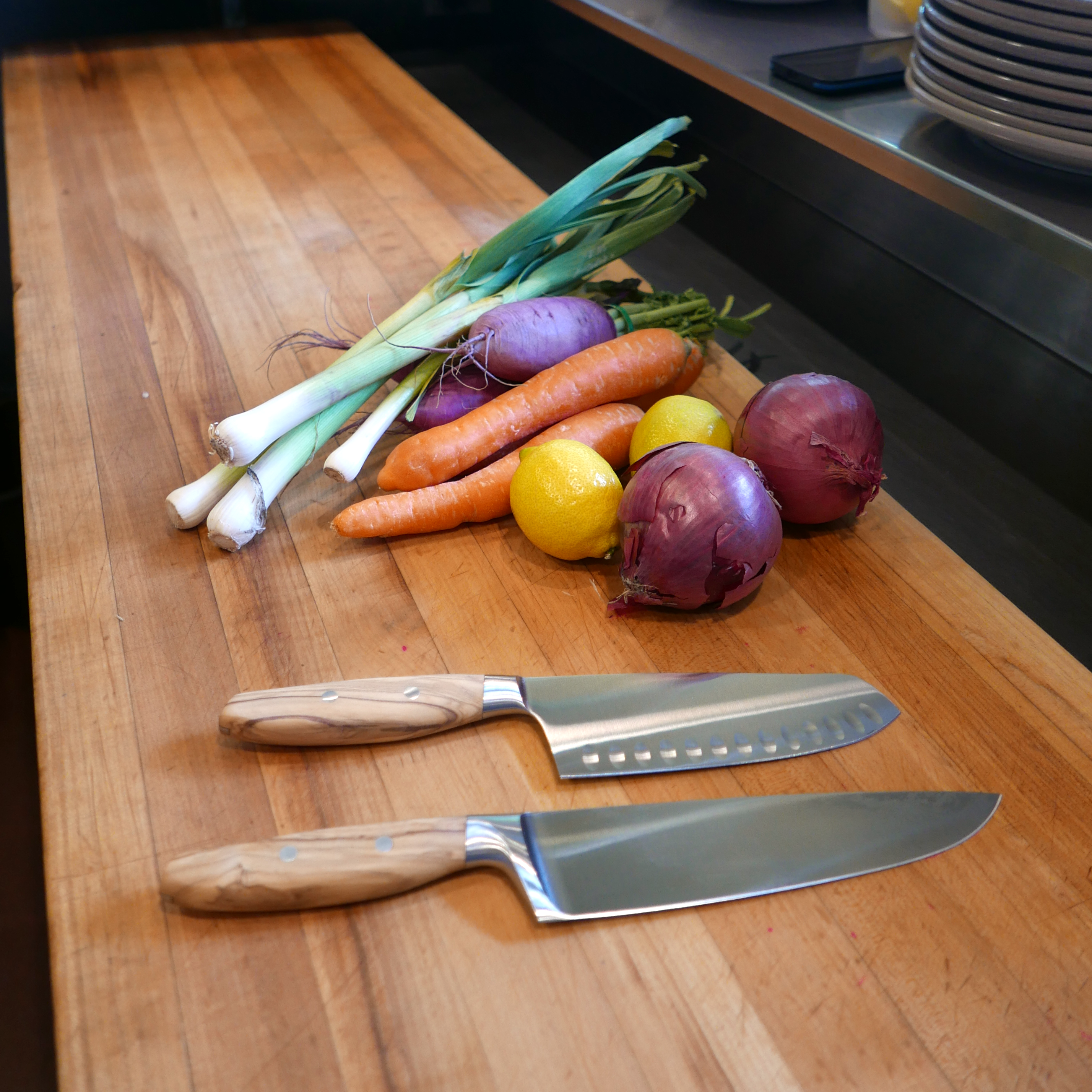 Amici knives with fresh vegetables