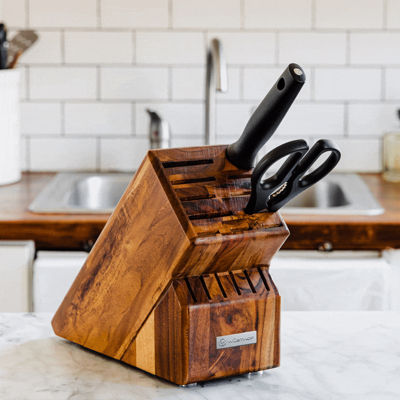 Animated gif showing several Wusthof knives in a Wusthof knife block.